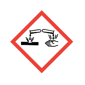 warning label depicting the corrosiveness of bleach on surfaces and hands